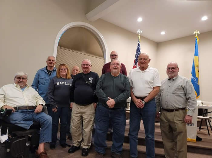 May be an image of 9 people, including Christianne Haggerty, Bob Kwiatkowski, Pete Kotowski and Scott Phillips, people standing and indoor